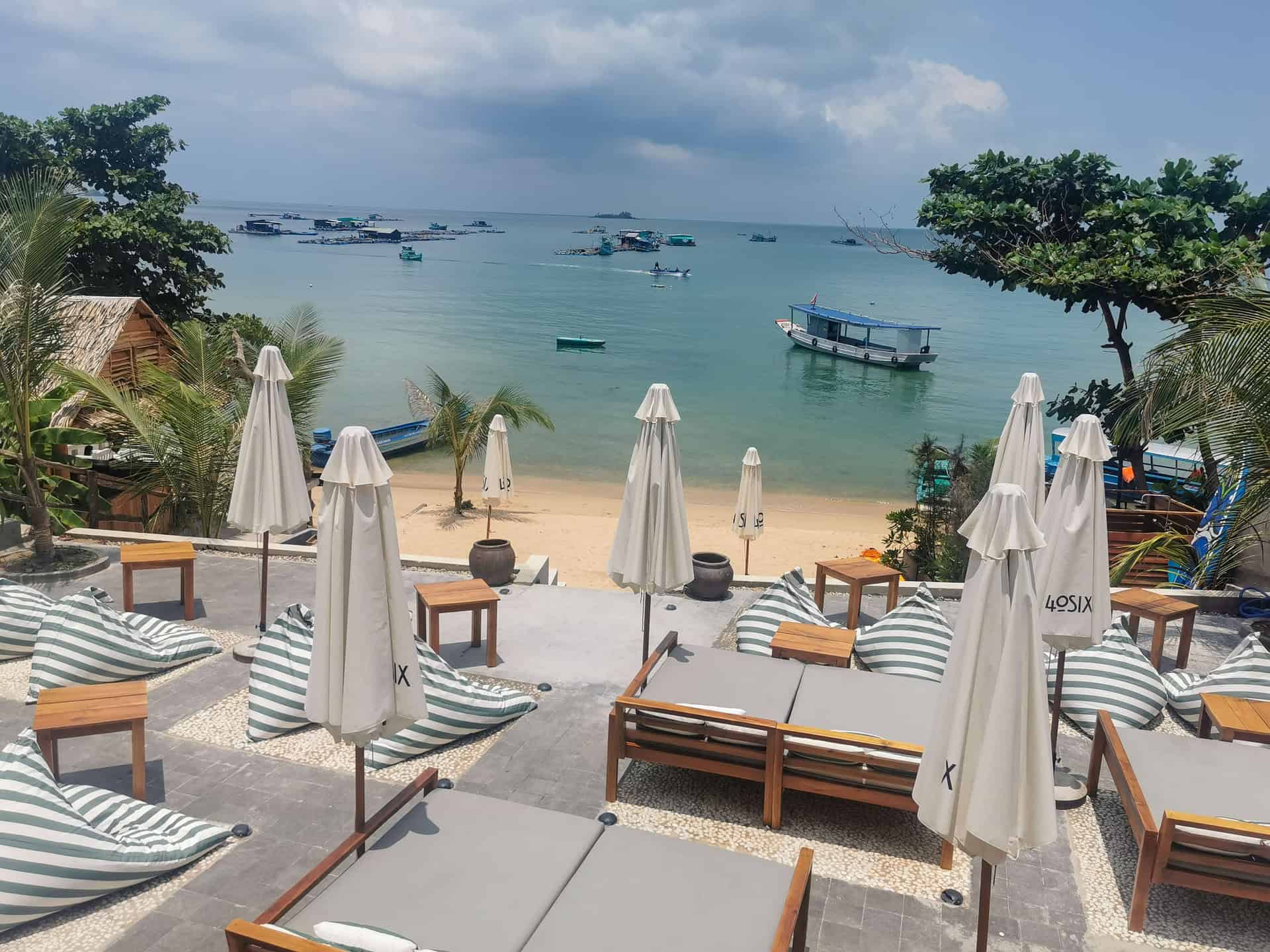 View of the chilled-out seating area and beach at 40 Six Beach Haus in Ganh Dauat, Phu Quoc