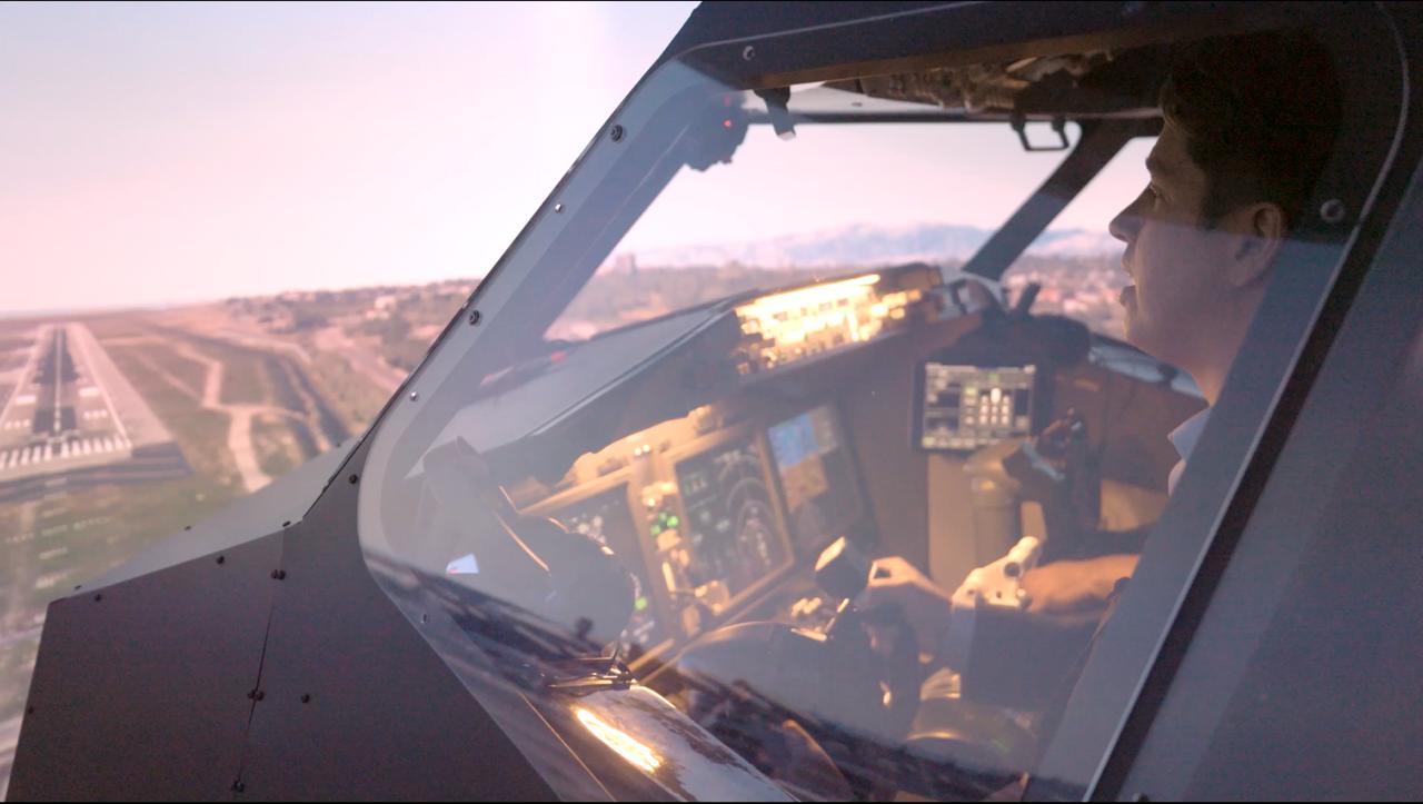 Guest piloting the WeFly Boeing 737 MAX simulator on final approach in Pasadena, CA