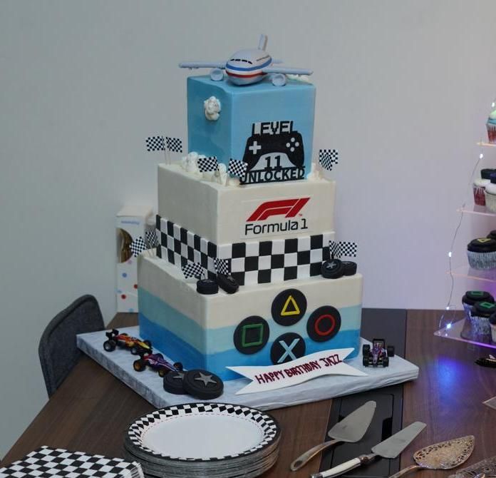 Birthday party with Formula 1 cake at WeFly simulator center in Pasadena, CA — private group event and celebration idea near Los Angeles