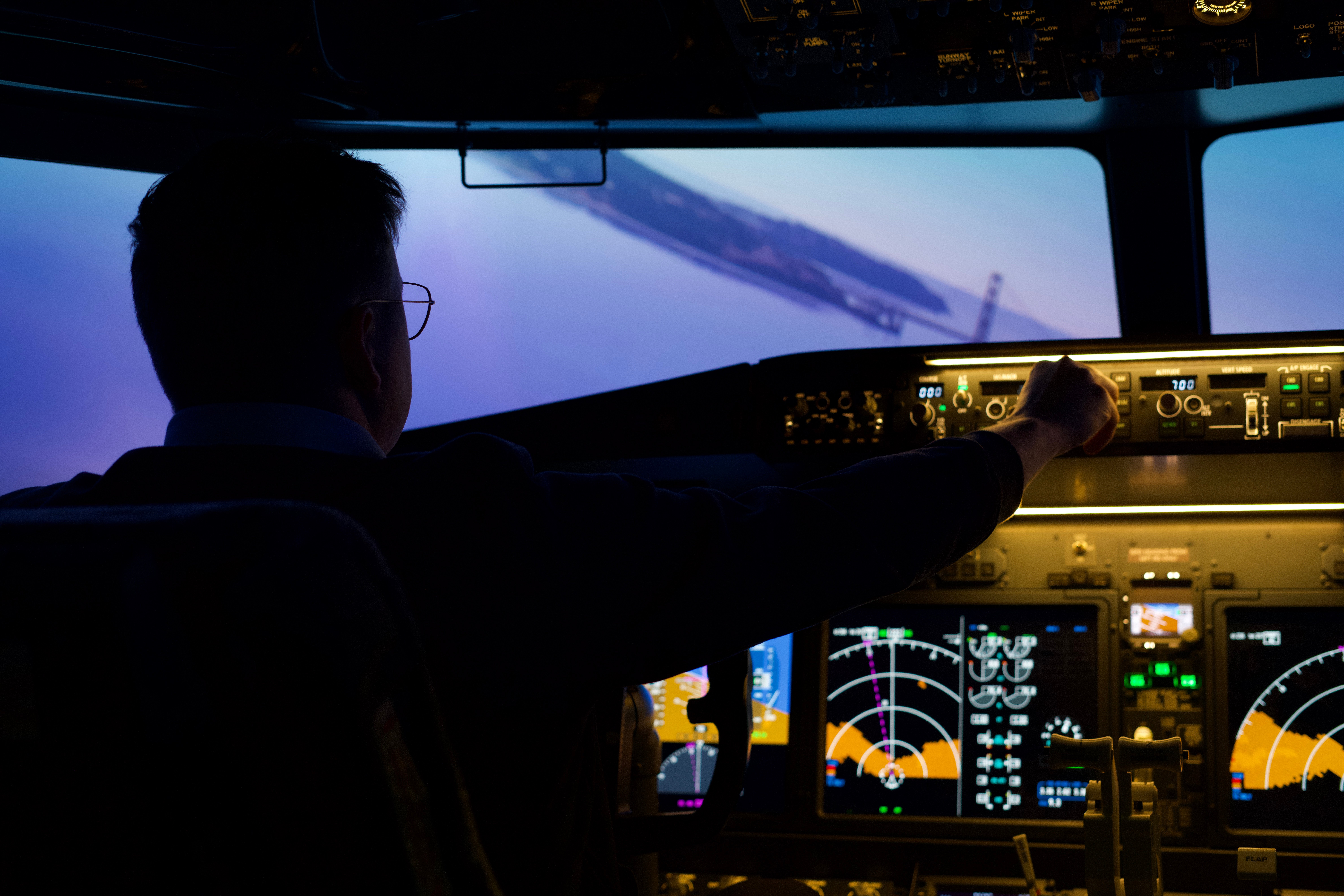 Instructor-guided Boeing 737 MAX simulator runway approach inside the WeFly cockpit in Pasadena, California