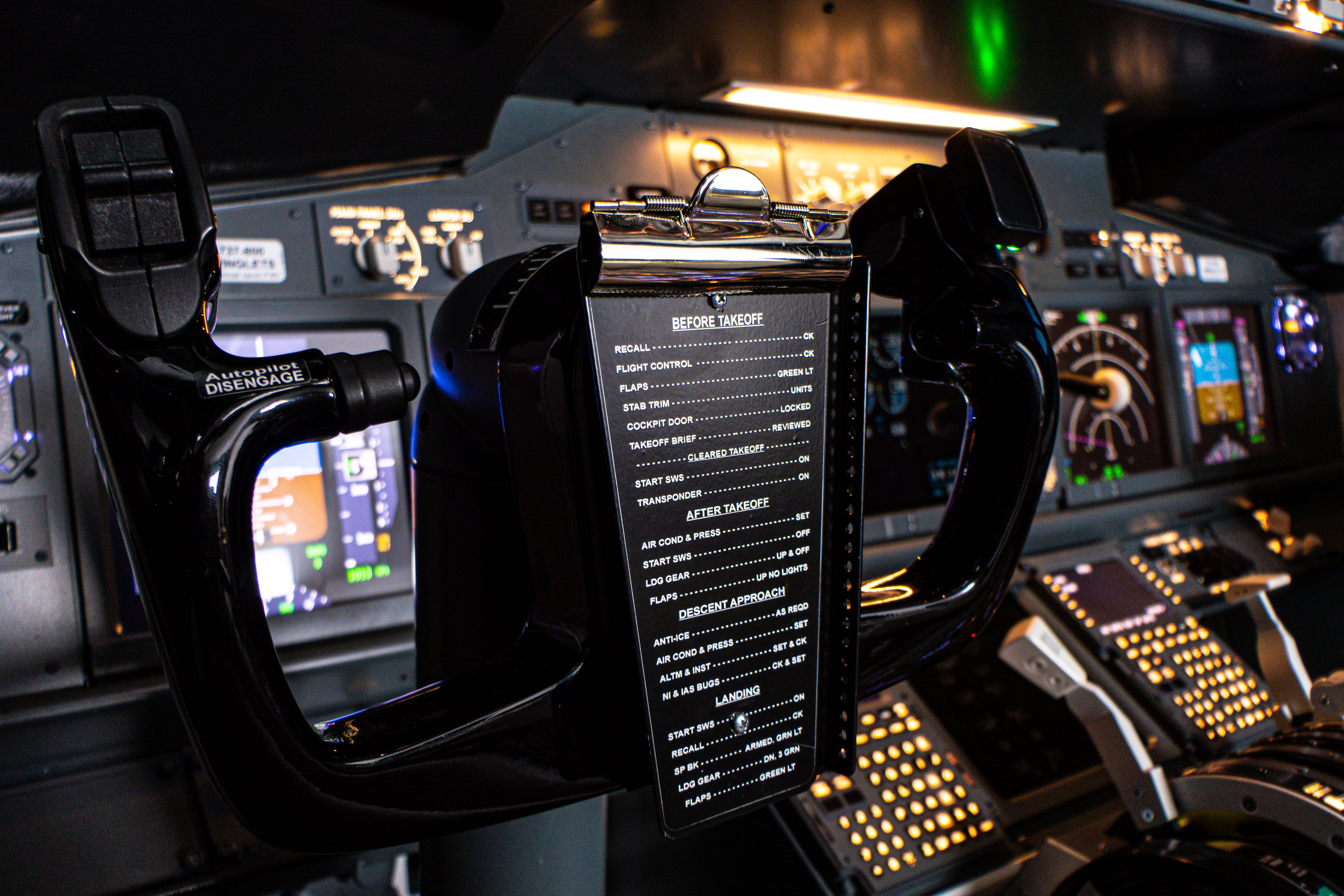 Flight control handle with instruction plate in Boeing 737 simulator