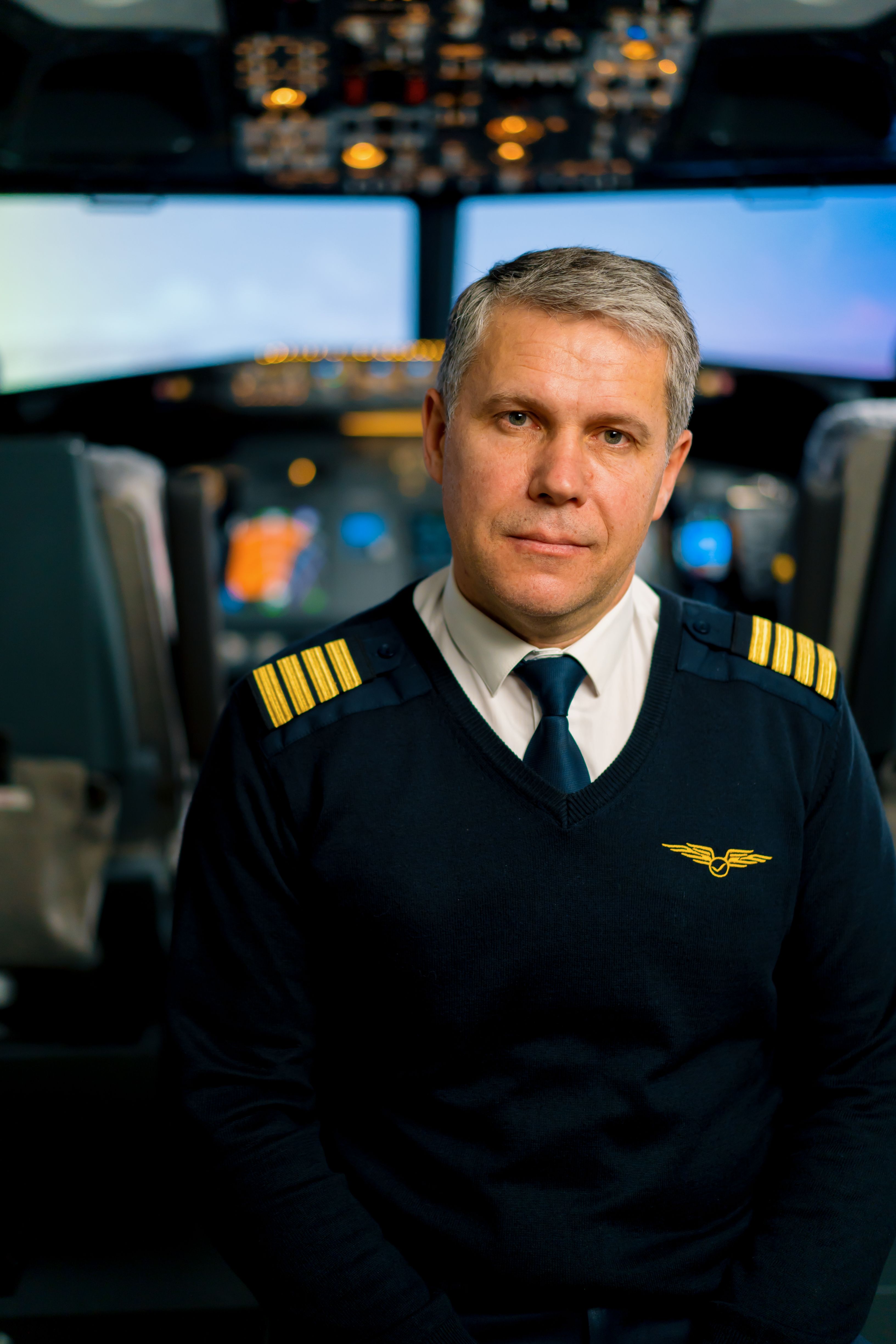 Pilot portrait in Boeing 737 simulator cockpit
