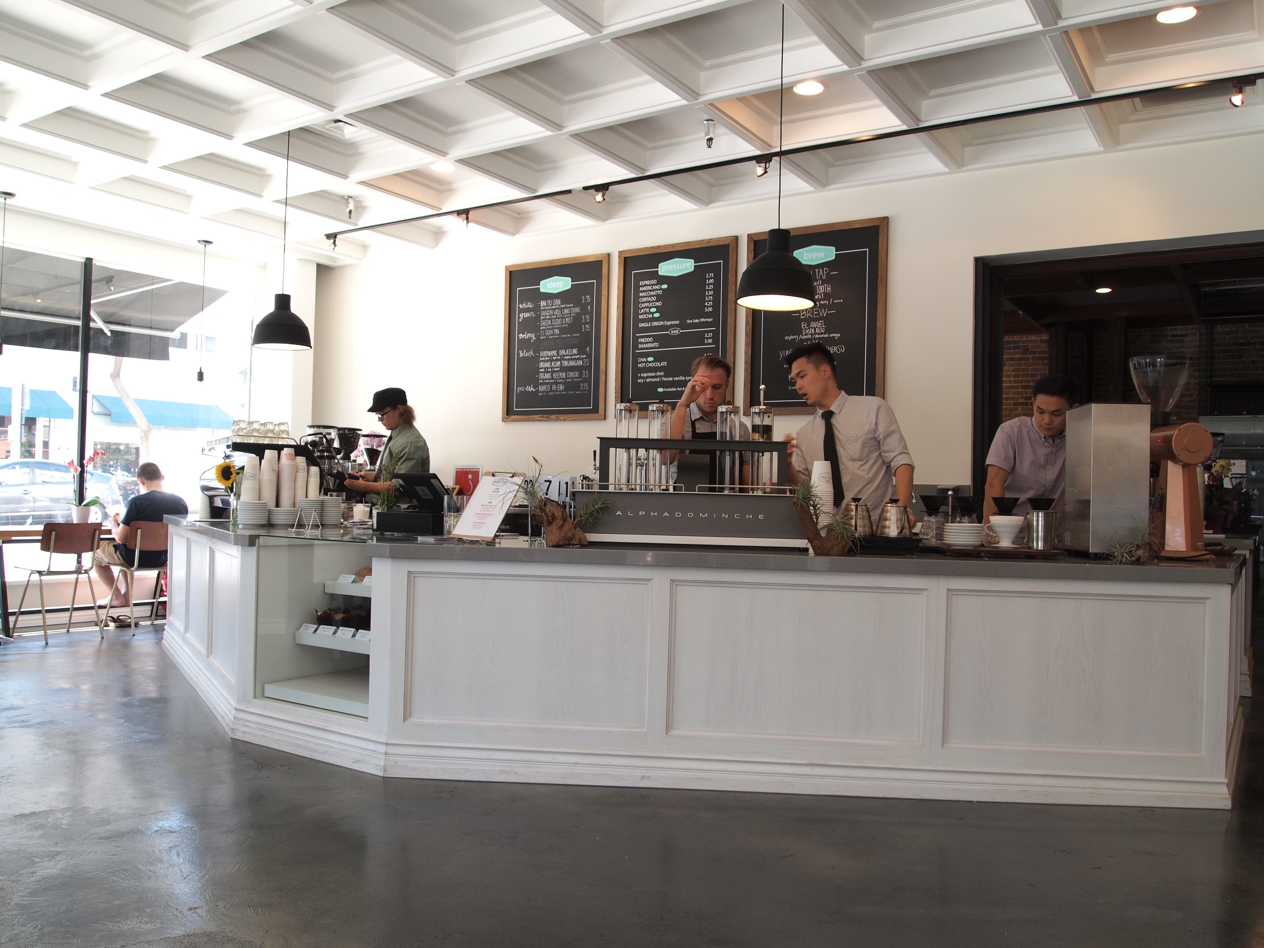 Cozy café interior in Old Pasadena with rain-streaked windows
