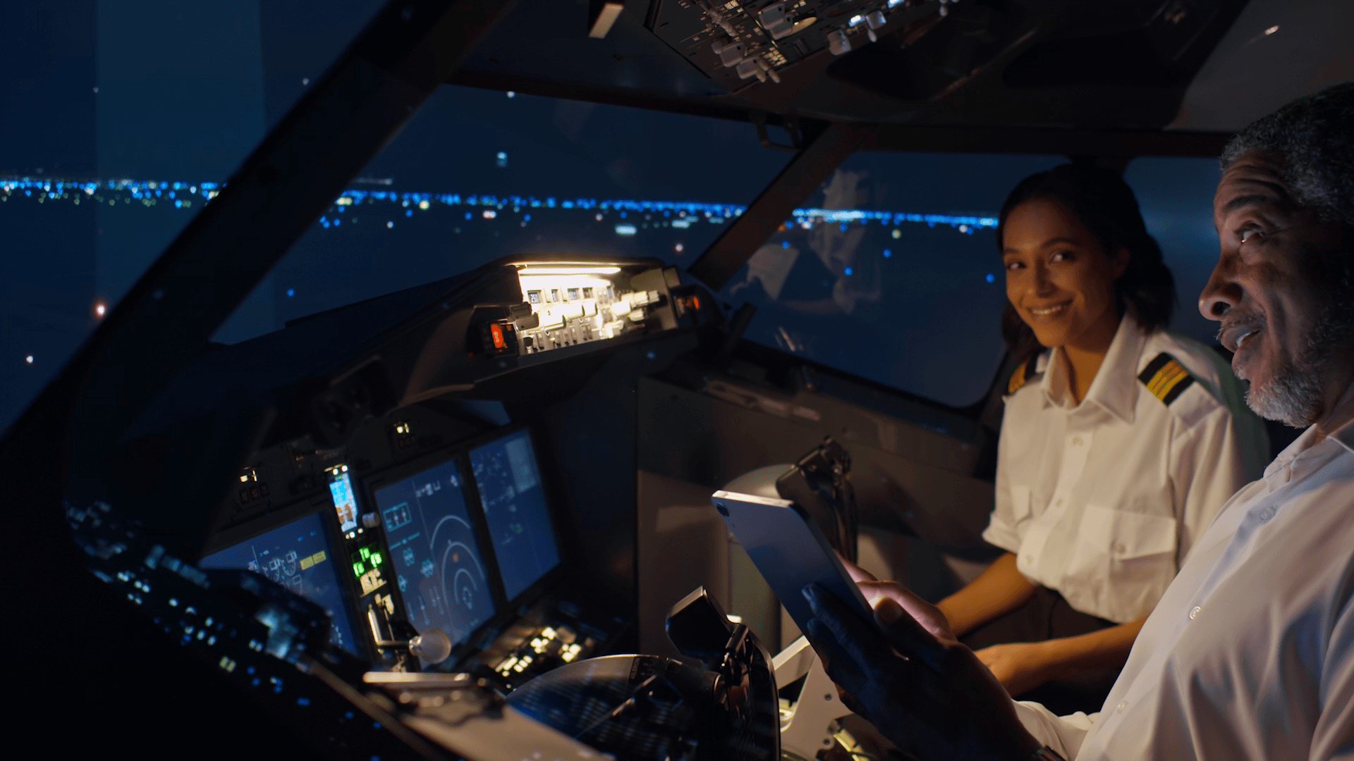 Pilots performing preflight check in Boeing 737 simulator