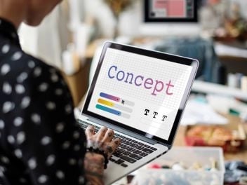 laptop screen with the word CONCEPT