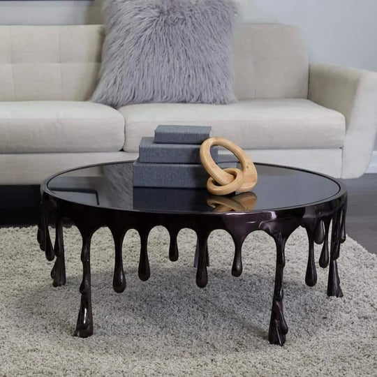 36-in-black-medium-round-aluminum-drip-coffee-table-with-melting-designed-legs-and-shaded-glass-top-1