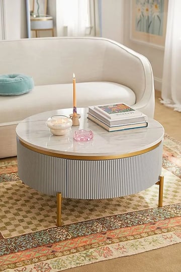 deco-round-cocktail-coffee-table-in-gold-at-urban-outfitters-1