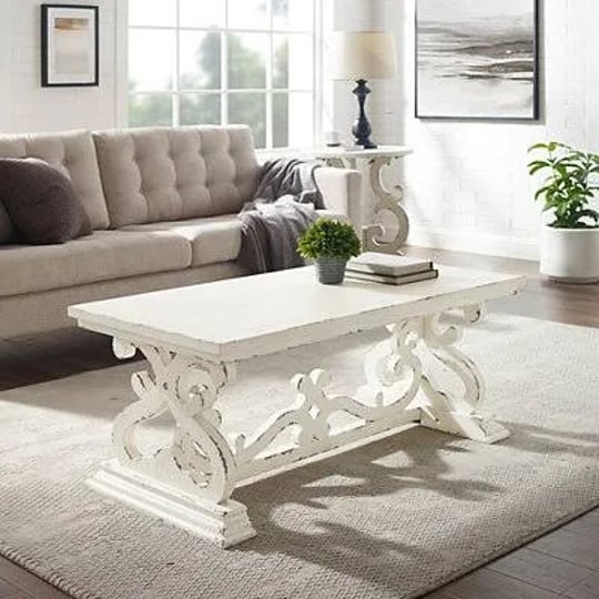 distressed-white-scrollwork-base-coffee-table-white-tan-46-4l-x-23-5w-18-9h-wood-kirklands-home-1