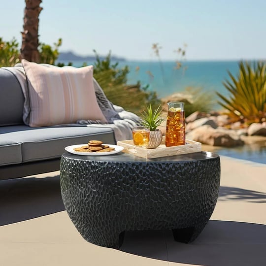 mod-black-cement-round-outdoor-coffee-table-wade-logan-1