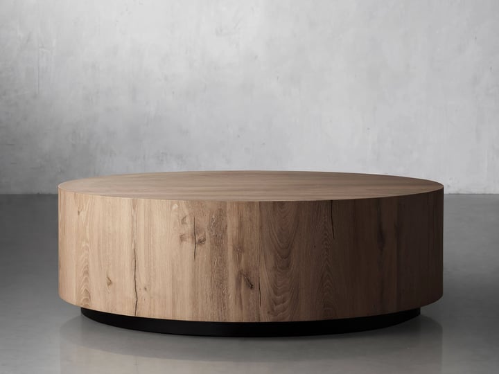 sullivan-round-plinth-coffee-table-in-wood-46-natural-arhaus-1