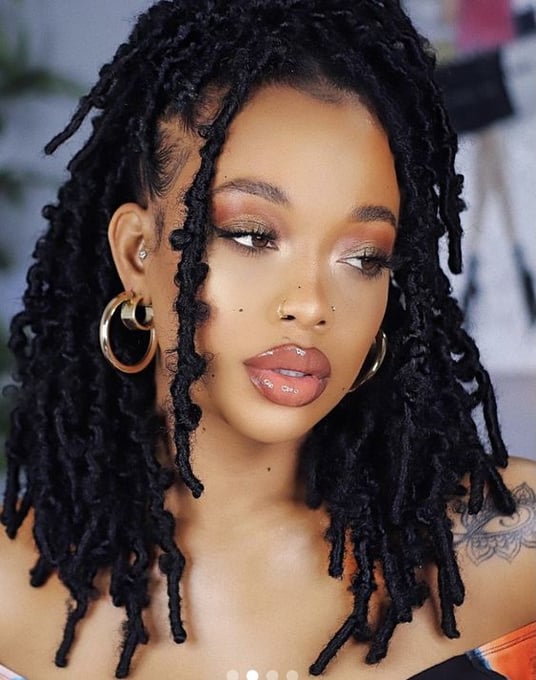 faux locs with curly bangs