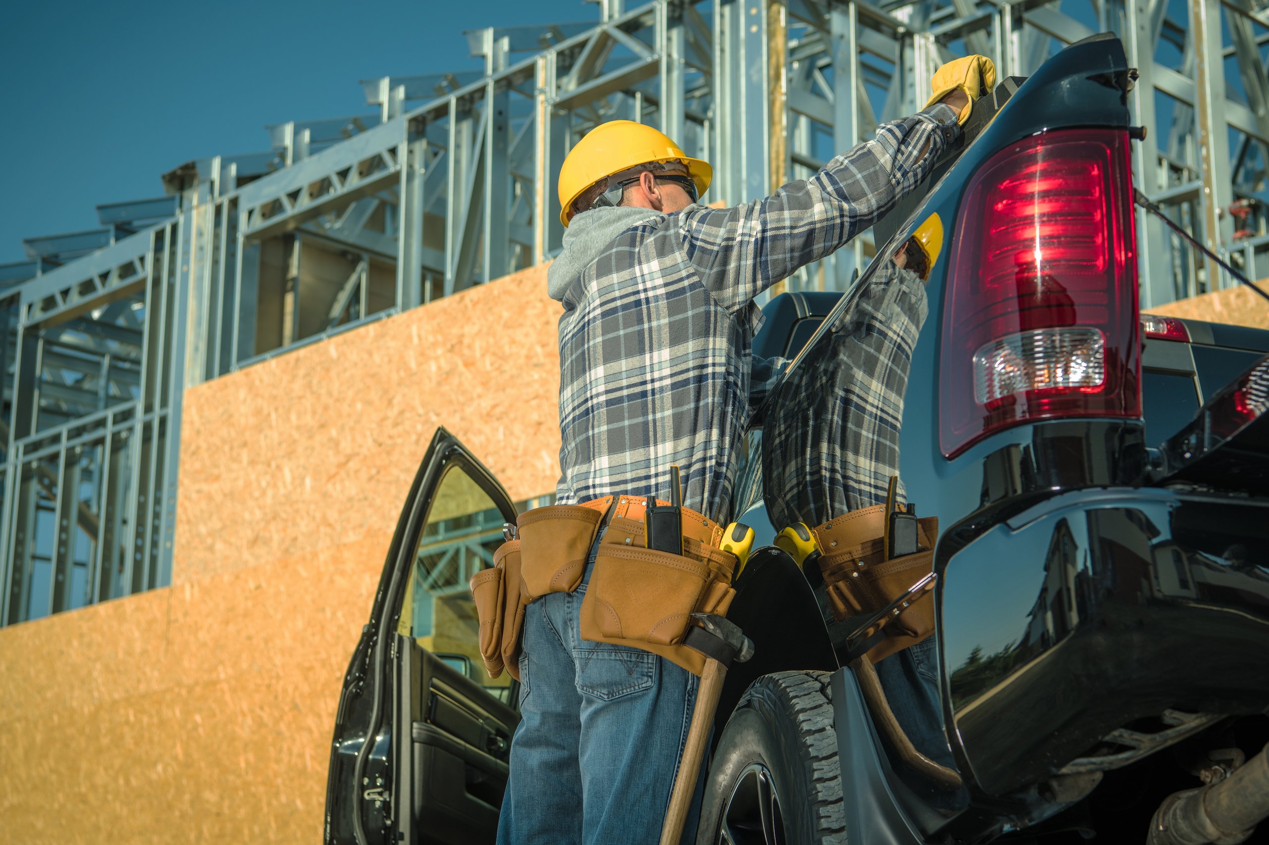 Holman employee unpacking his vehicle