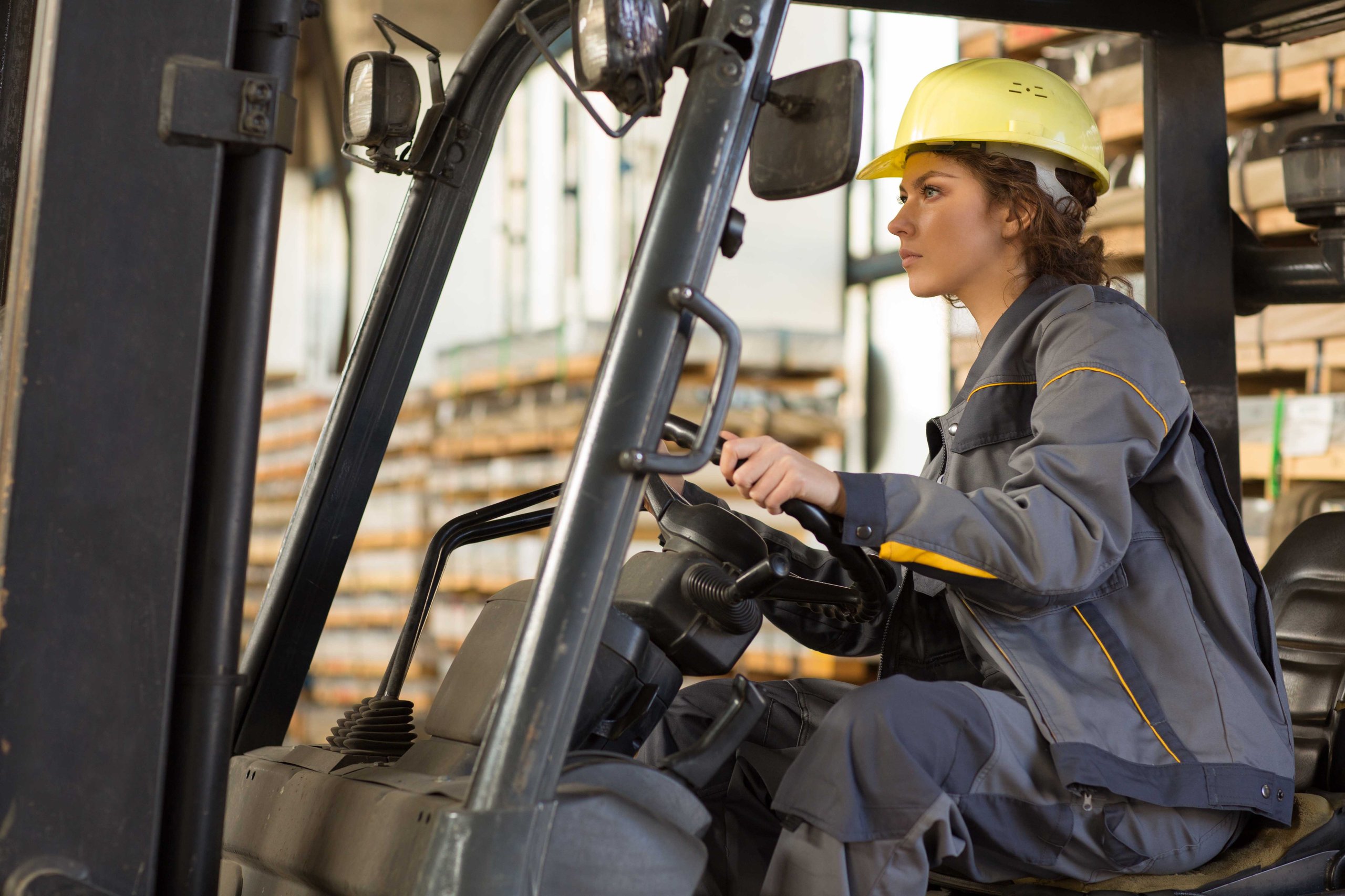 Holman employee driving a forklift
