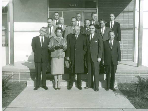Black and white picture of people standing