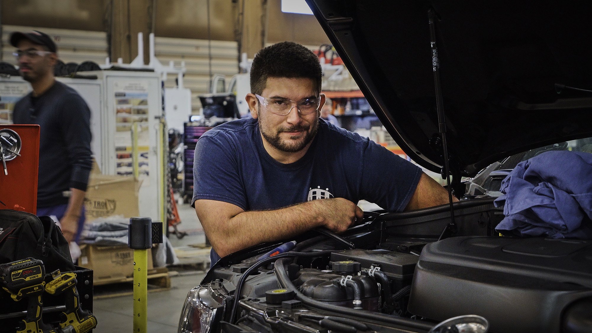 a man working on a car