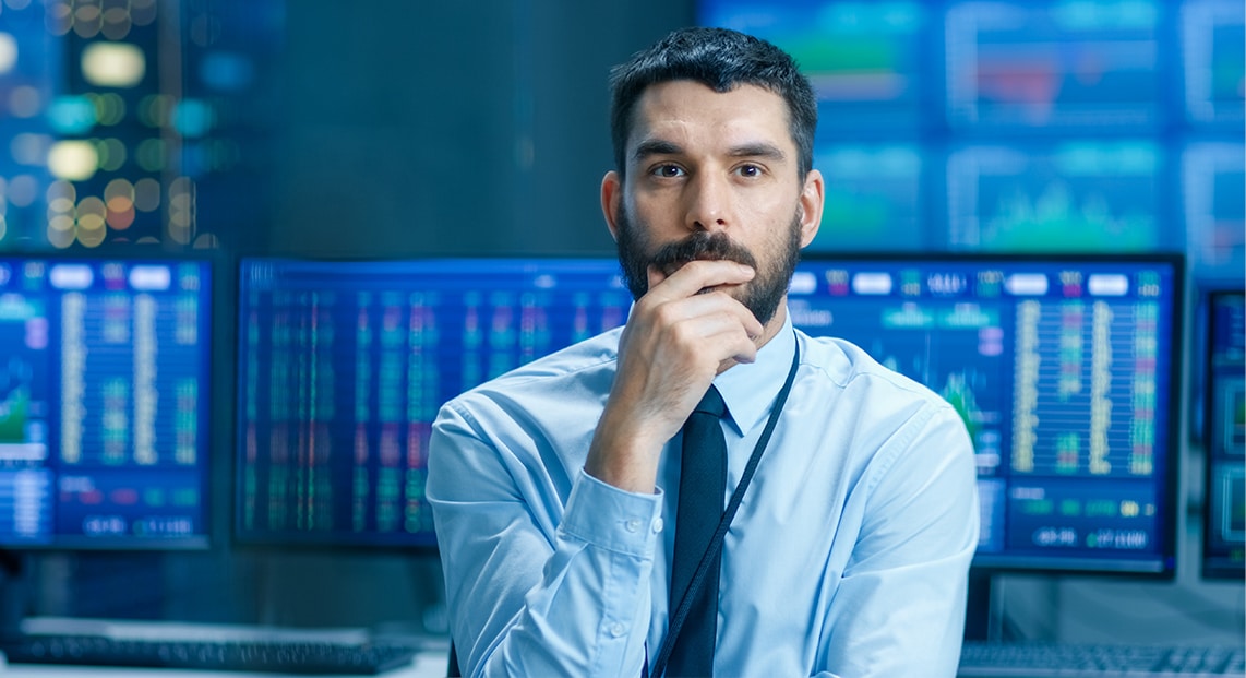 a man with his hand on his chin