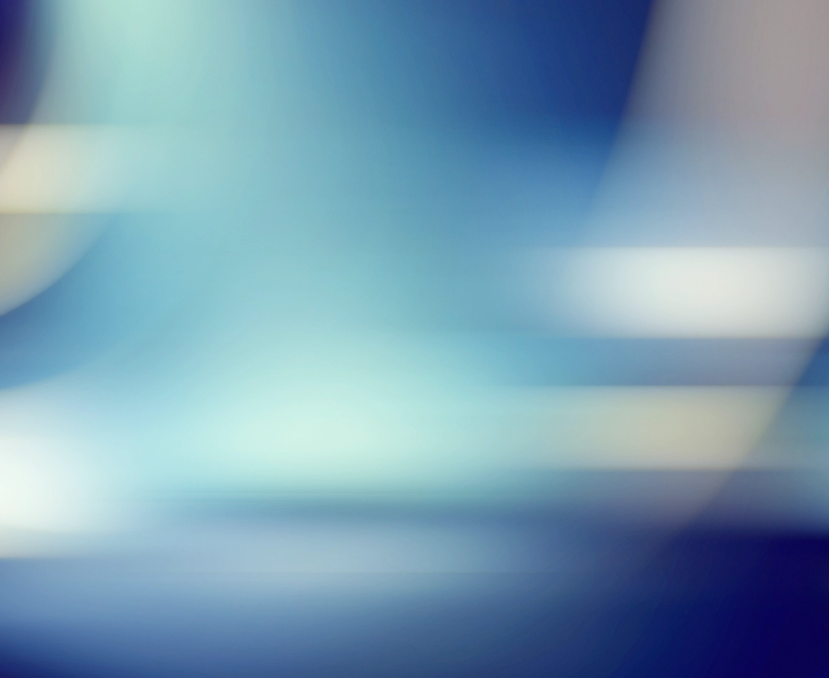 a blurry blue and white background