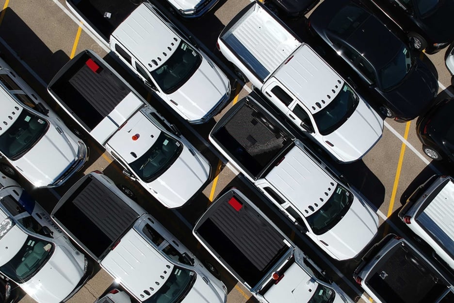 a group of cars parked in a parking lot