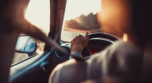 a person driving a car