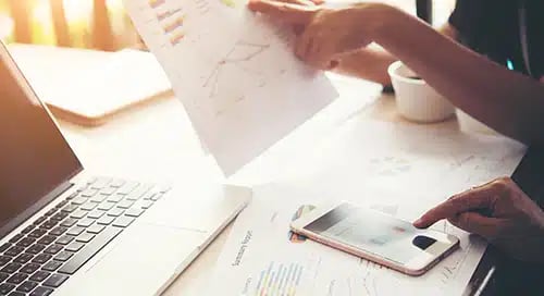 a person holding a piece of paper