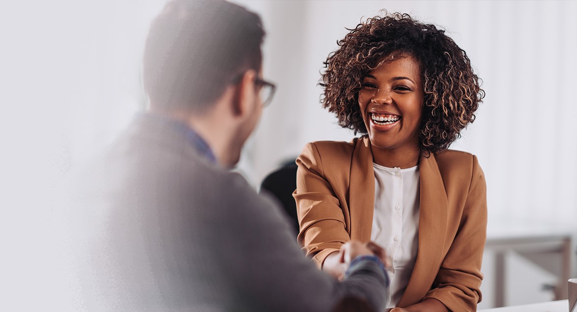 a man and woman shaking hands