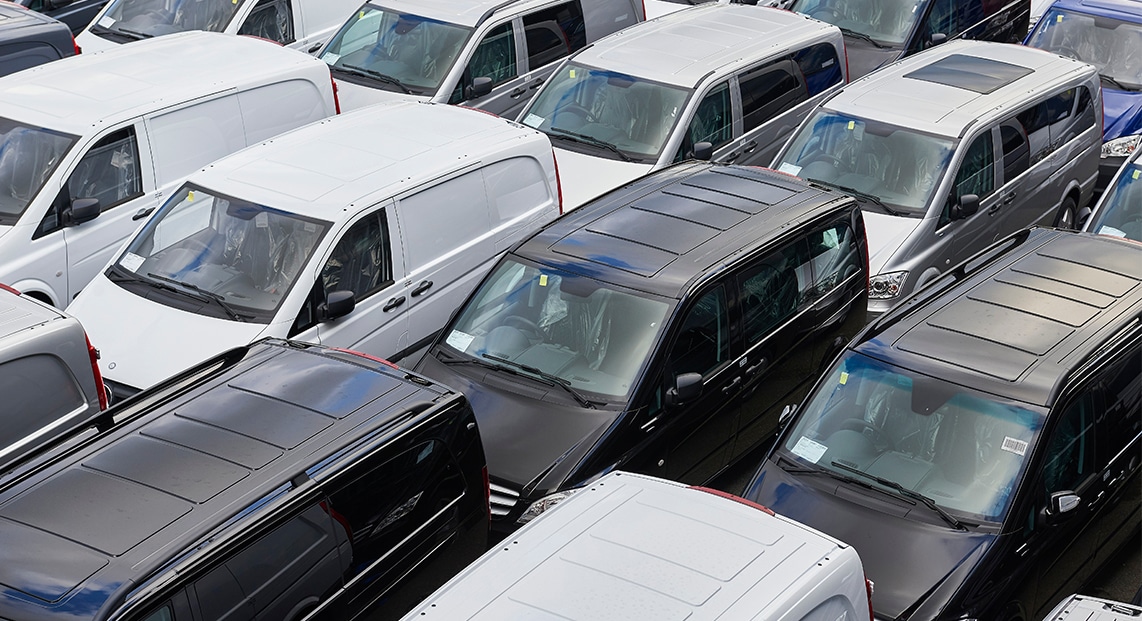 a group of cars parked in a parking lot