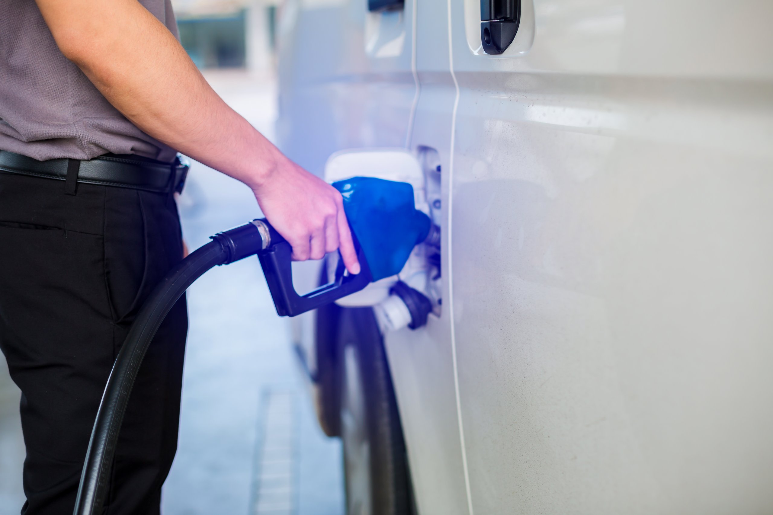 Man filling up a gas tank