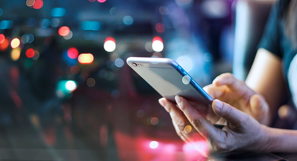 a person holding a cell phone