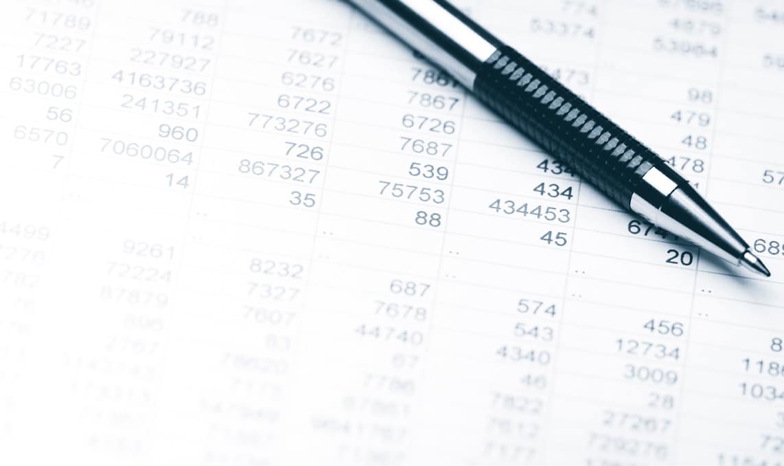 a pen lying on a piece of paper