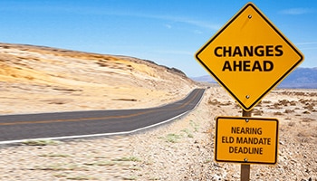 a road sign on a desert road