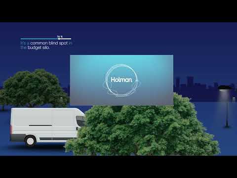 a white van parked next to trees