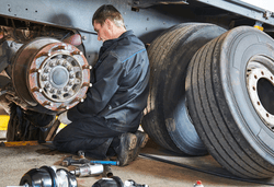 a man working on a wheel