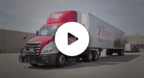 a red and white semi truck