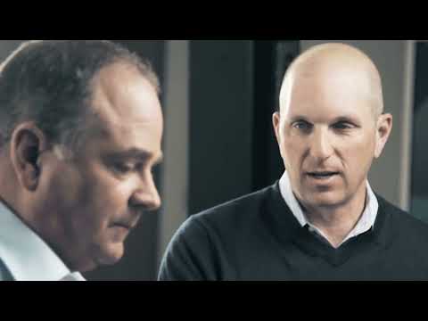 a man looking at another man