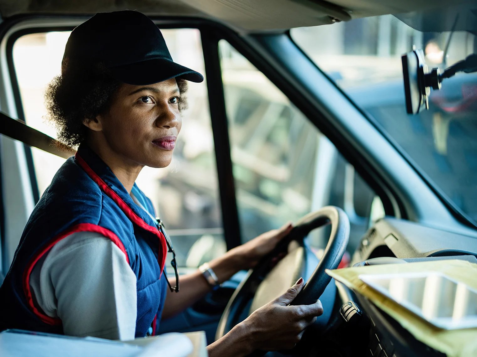 a woman driving a car 