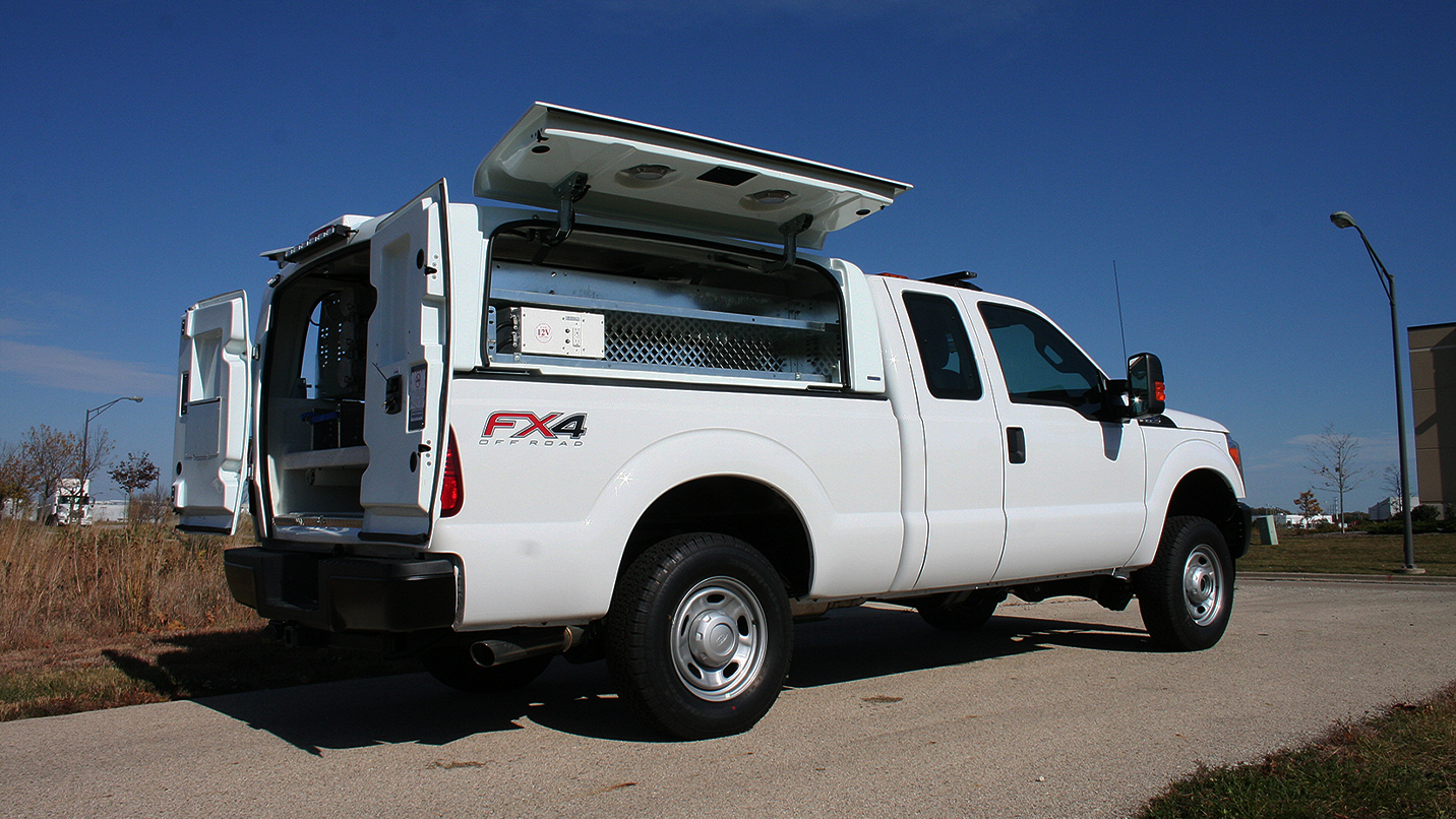 a white truck with the door open