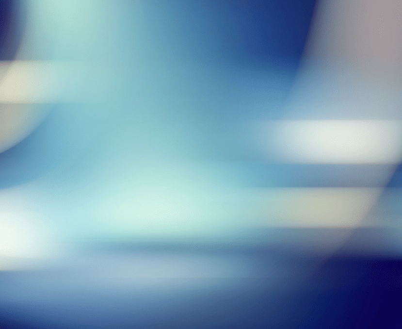 a blurry blue and white background