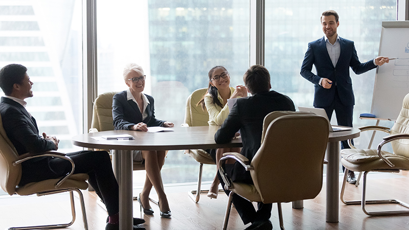 a group of people sitting at a table