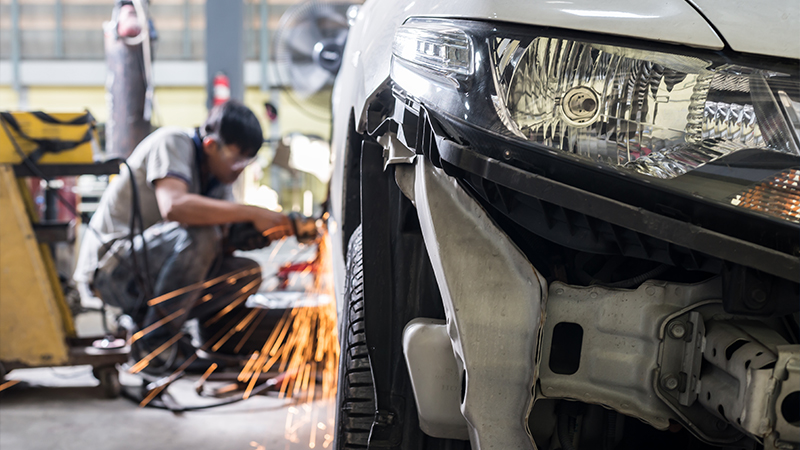 a man working on a car