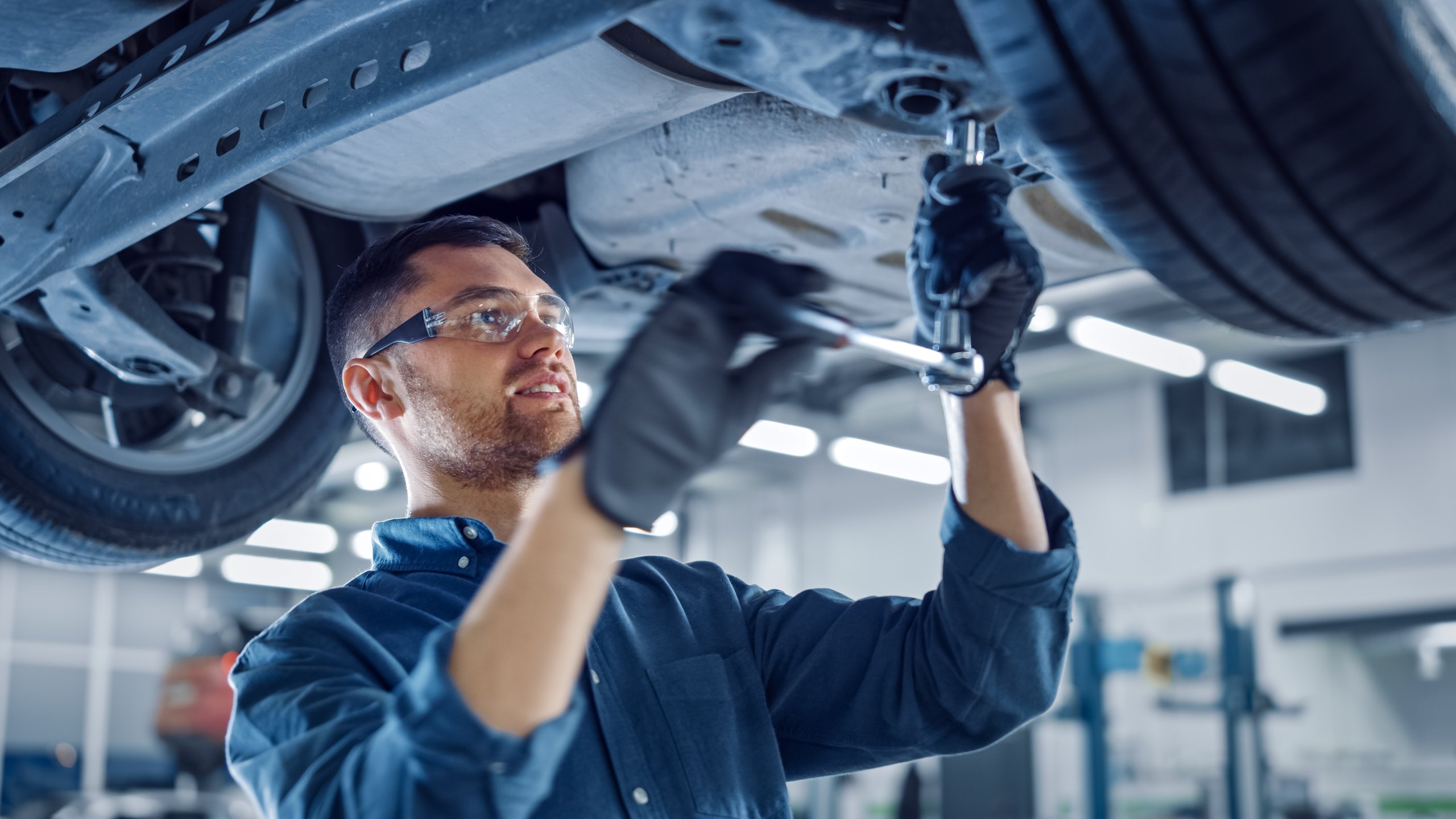 a man working on a car