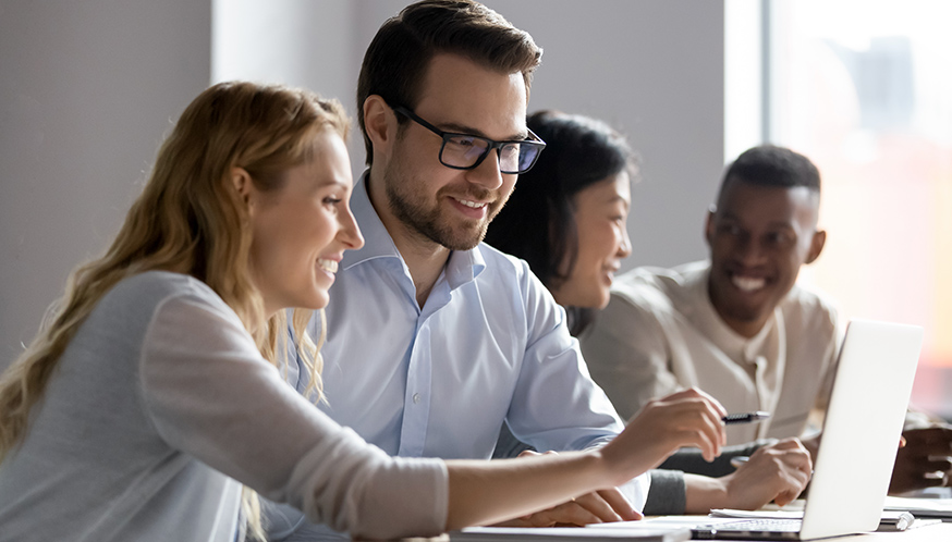 a group of people sitting at a table