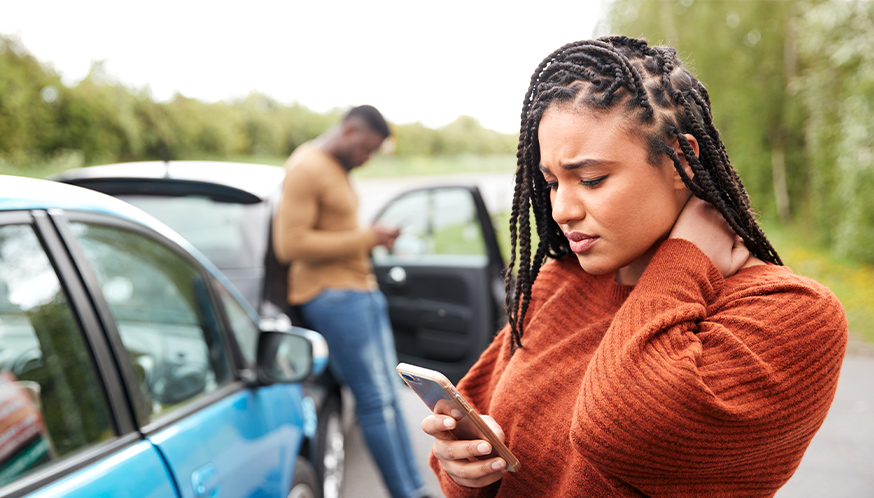a woman looking at her phone