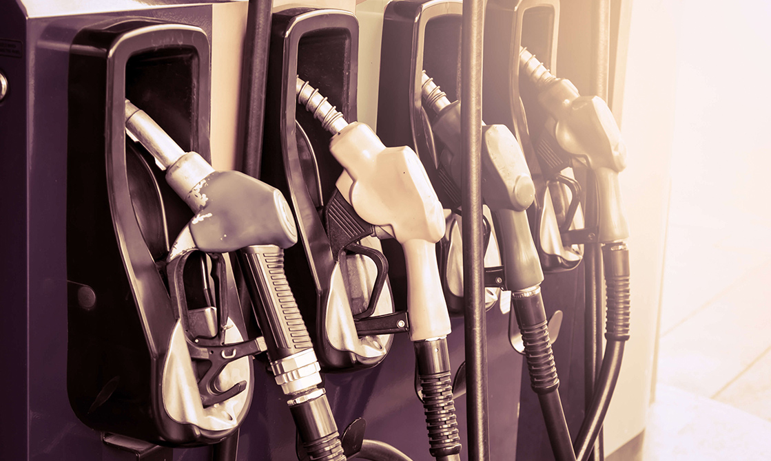 a row of gas pumps
