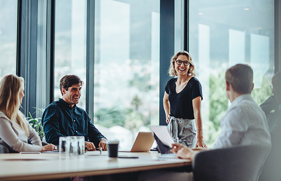 a group of people in a meeting