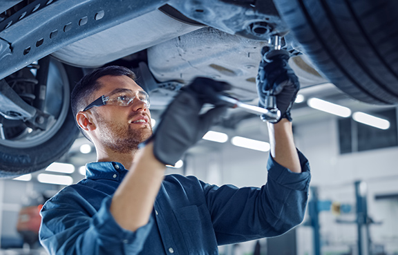 a man working on a car
