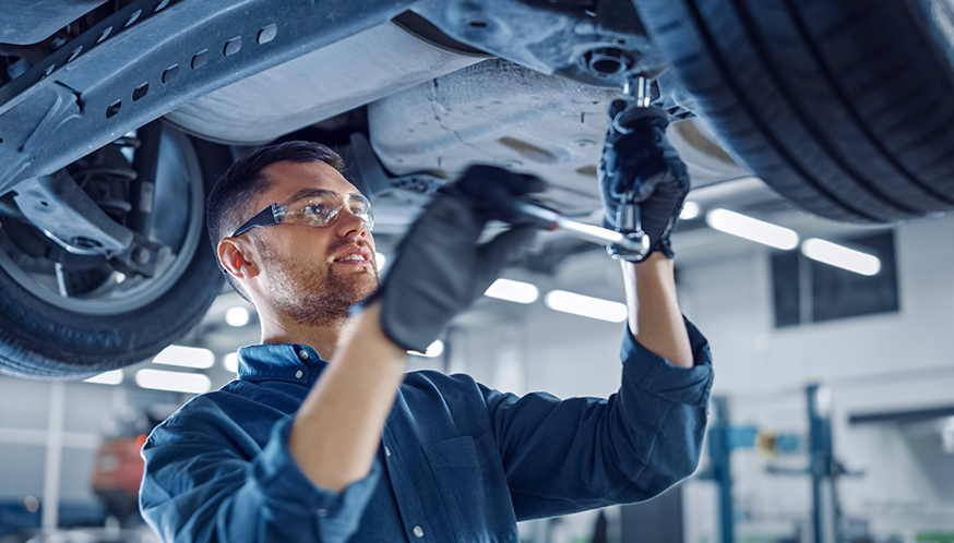 a man working on a car