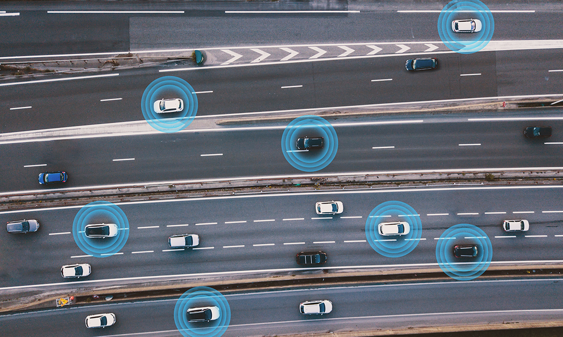 cars on a road with blue circles around it