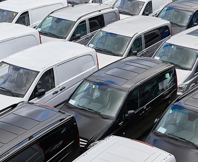 a group of cars in a parking lot