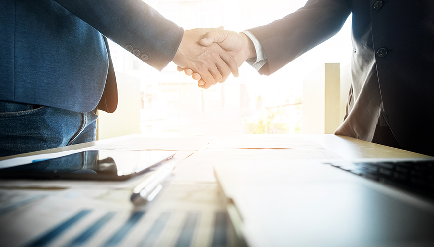 a close-up of a handshake