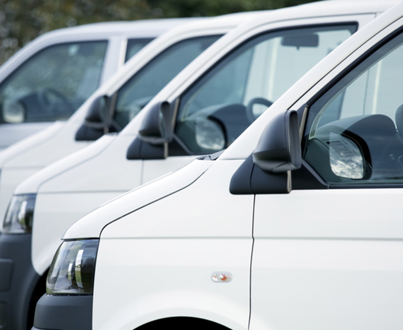 a row of white vans